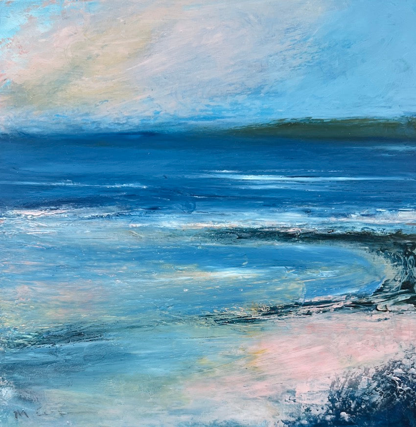 peach skies and soft pink reflections on the beach