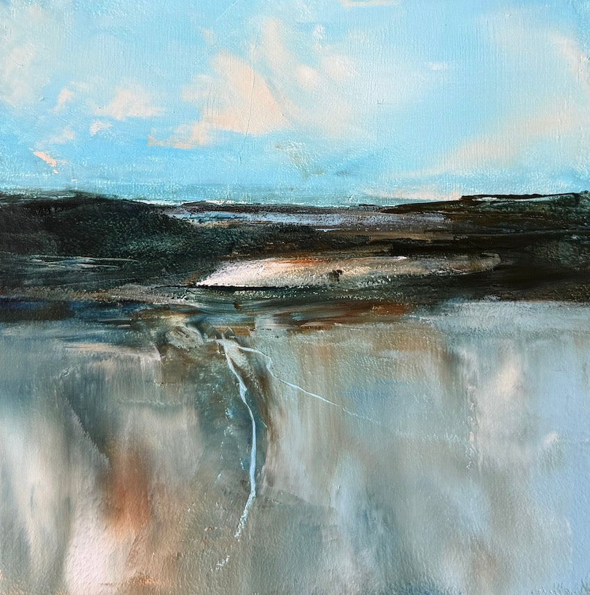 An abstract landscape painting featuring a light blue sky with soft white clouds above dark, textured landforms and reflected light on wet sands in the foreground by Maggie Cochran